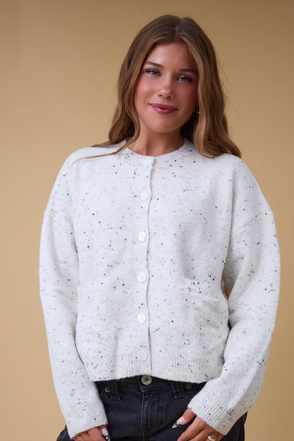 The Promise Speckled Cardigan in cream fleck for women and teenage girls.