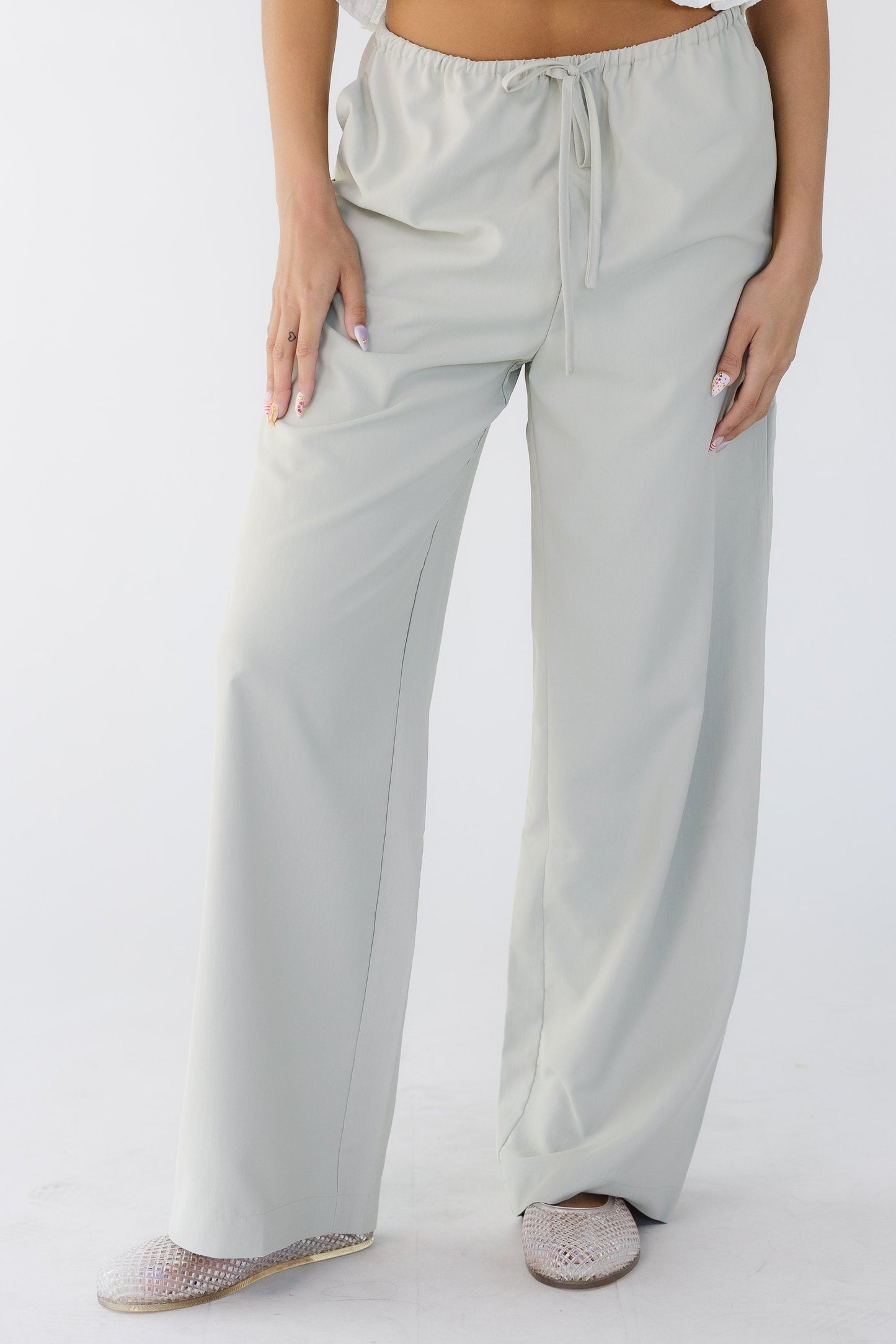 The Evelyn Pants  in taupe grey for women and teens.