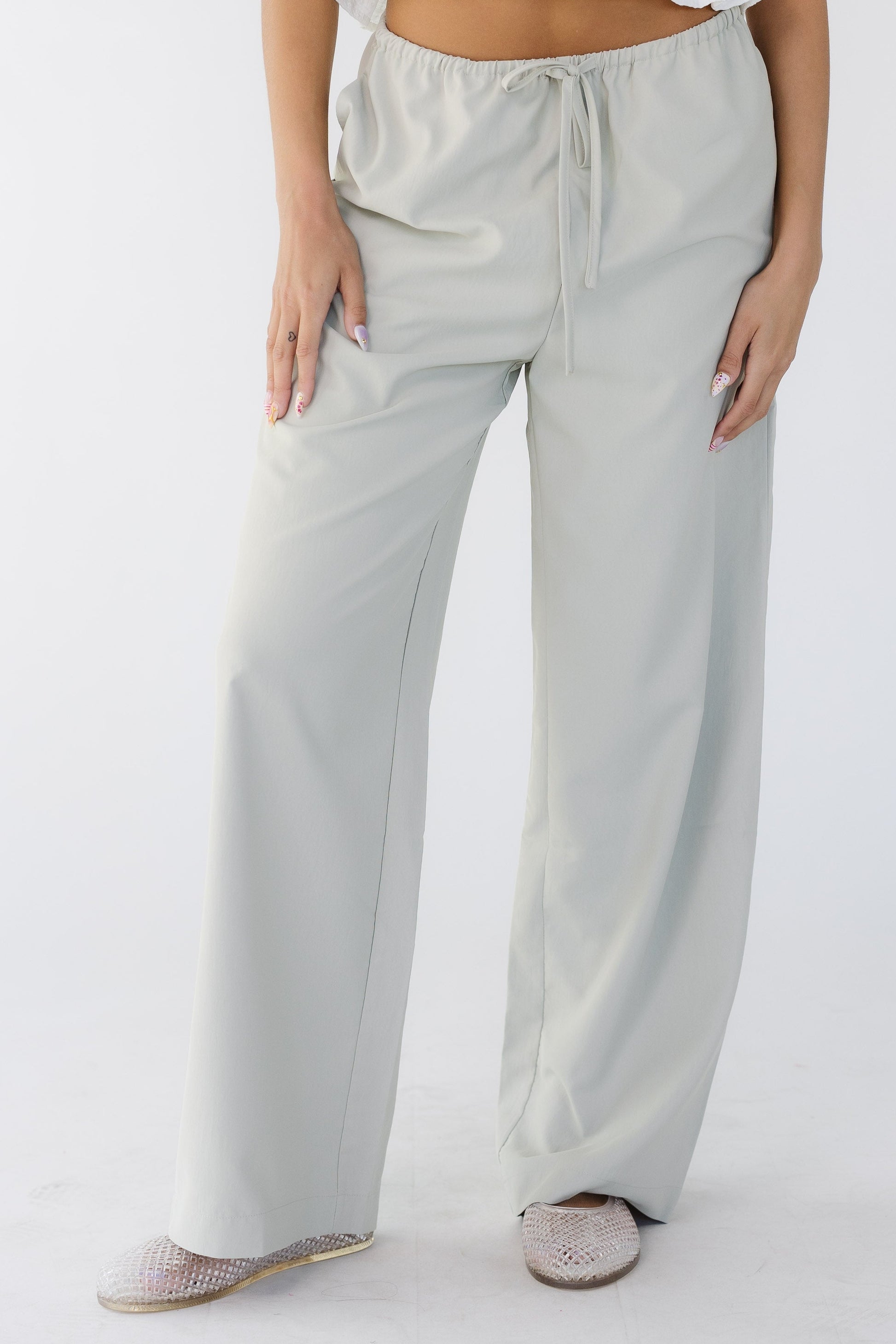 The Evelyn Pants  in taupe grey for women and teens.