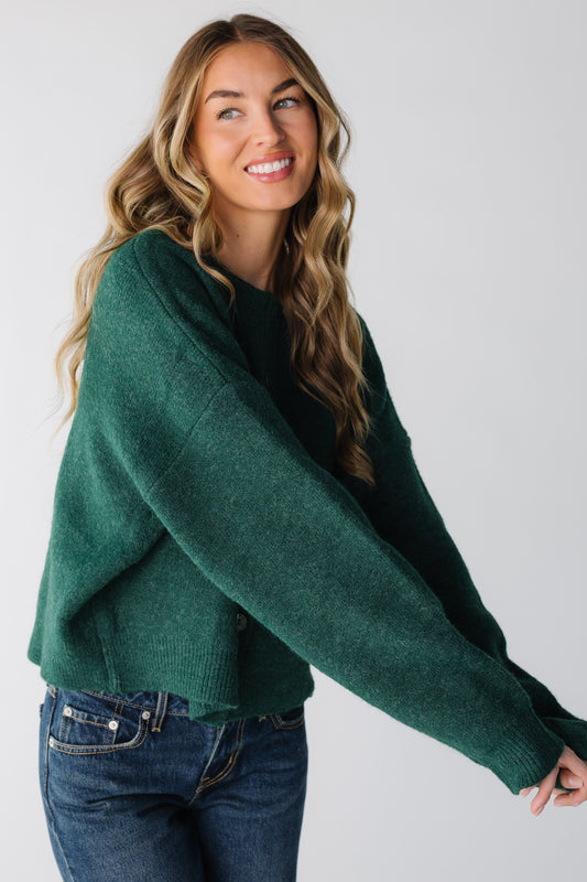 The Underestimated Cable Knit Cardigan for women in forest green