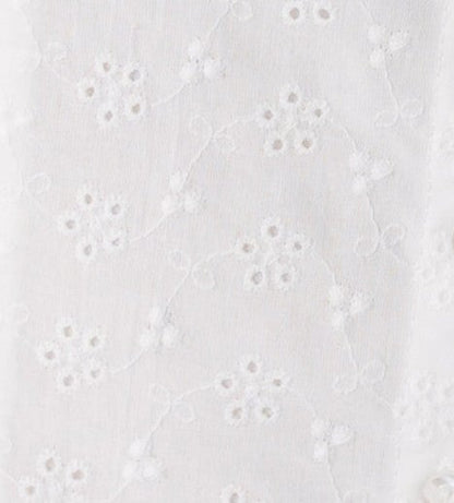 White eyelet fabric swatch.