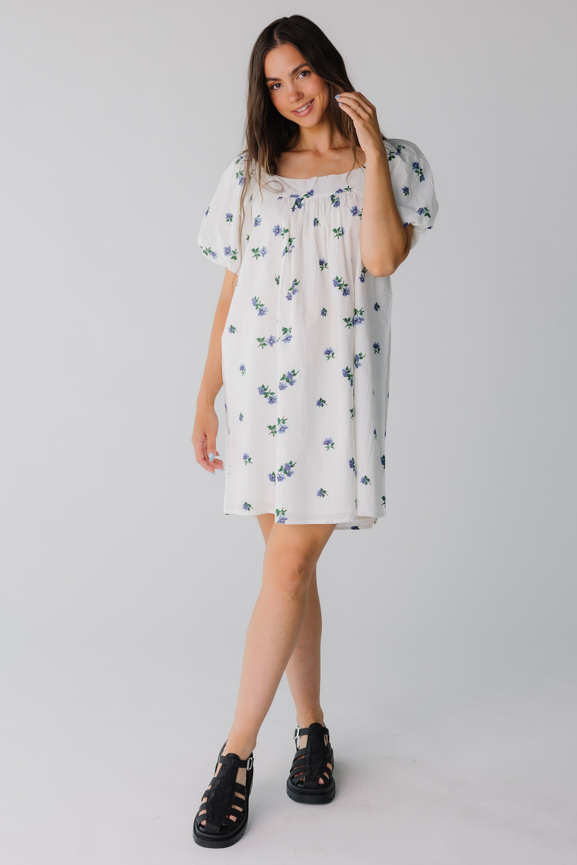 White loose fitting knee length dress with balloon sleeves