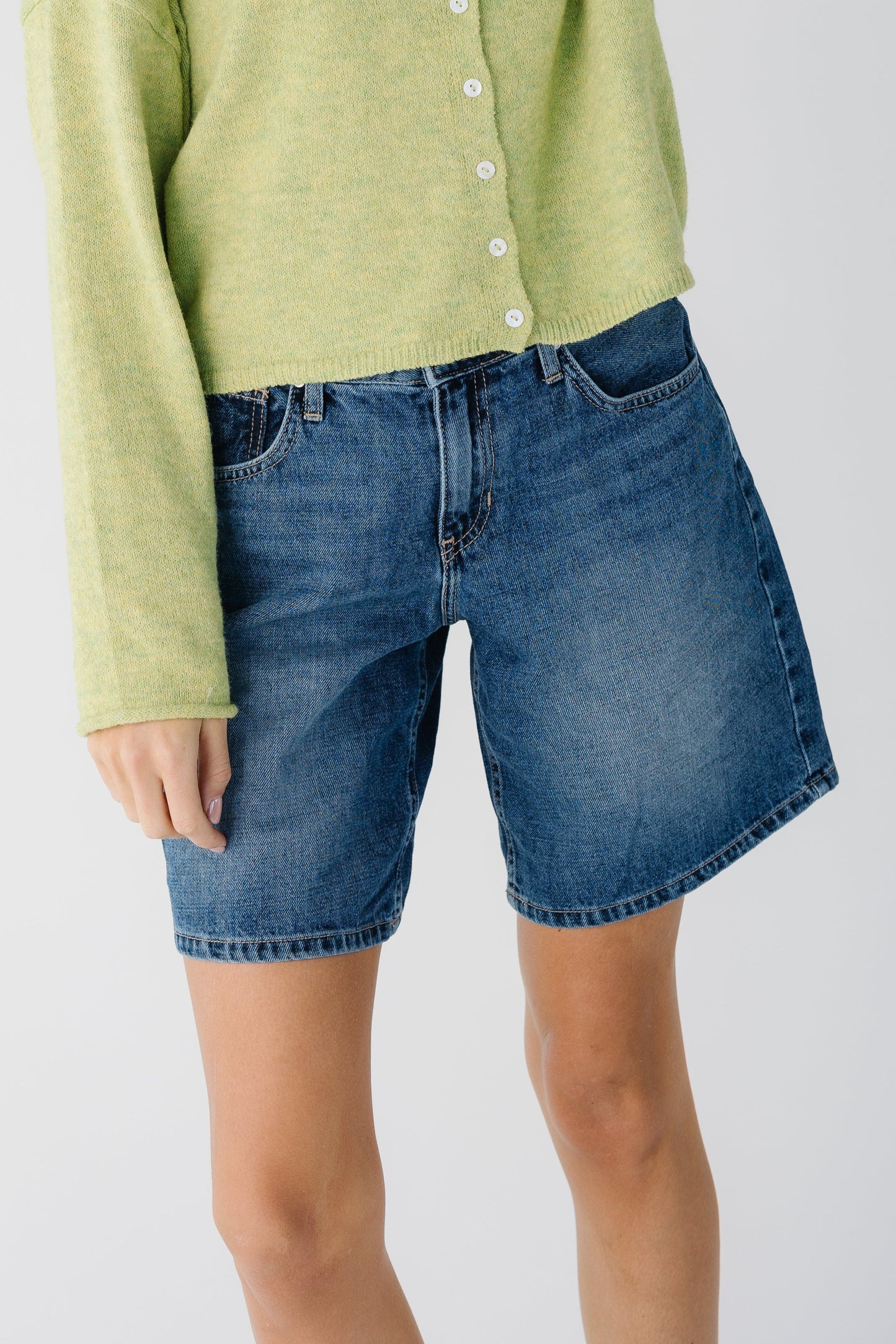 Close view of wide leg jean shorts