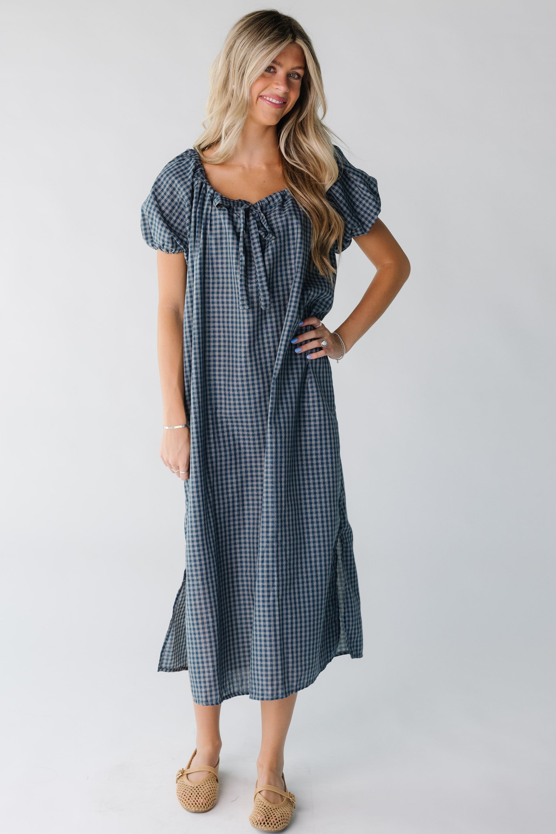 Modest women's gingham midi dress with short sleeves in blue