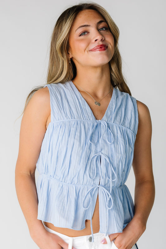 The Textured Bow Tank in light blue for women and teens.