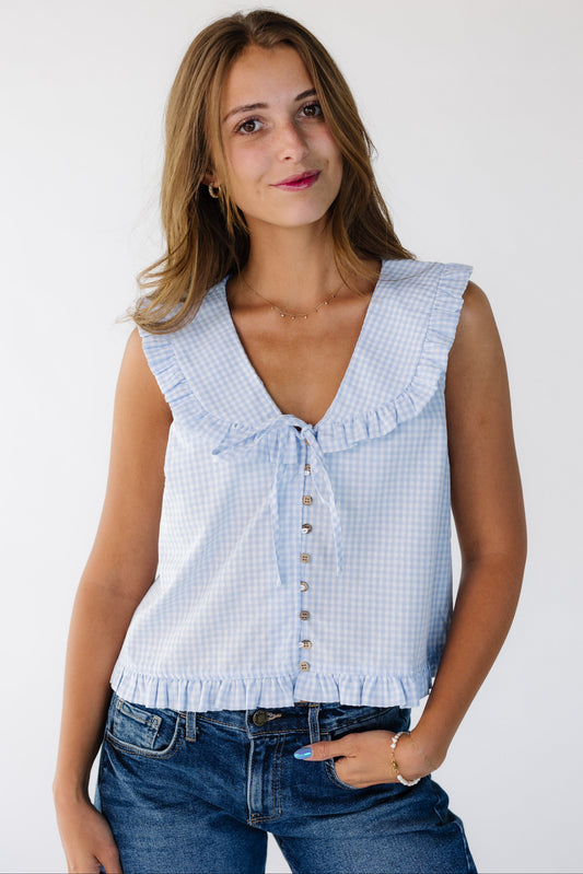 The Nora Top in sky blue and white for women and teens.