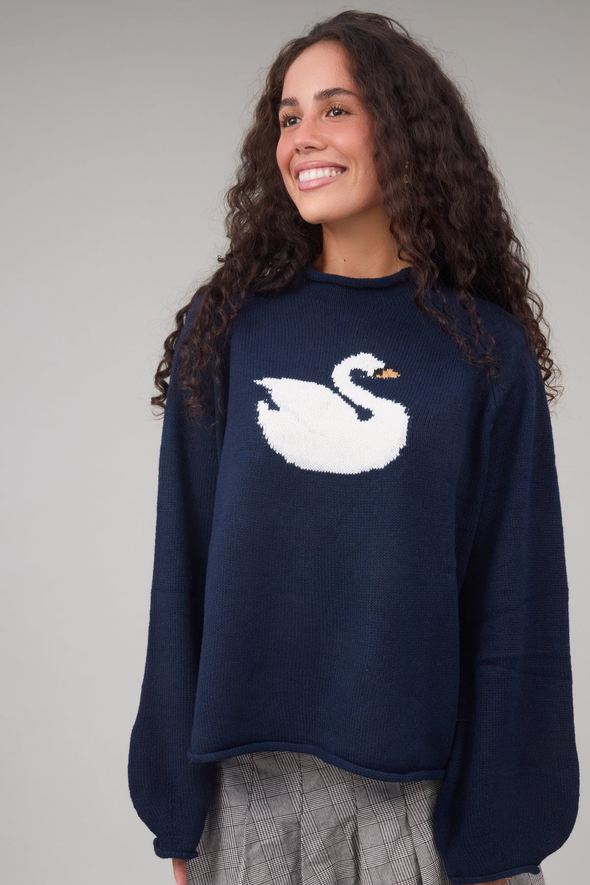 The Swan Sweater in navy for women and teen girls.