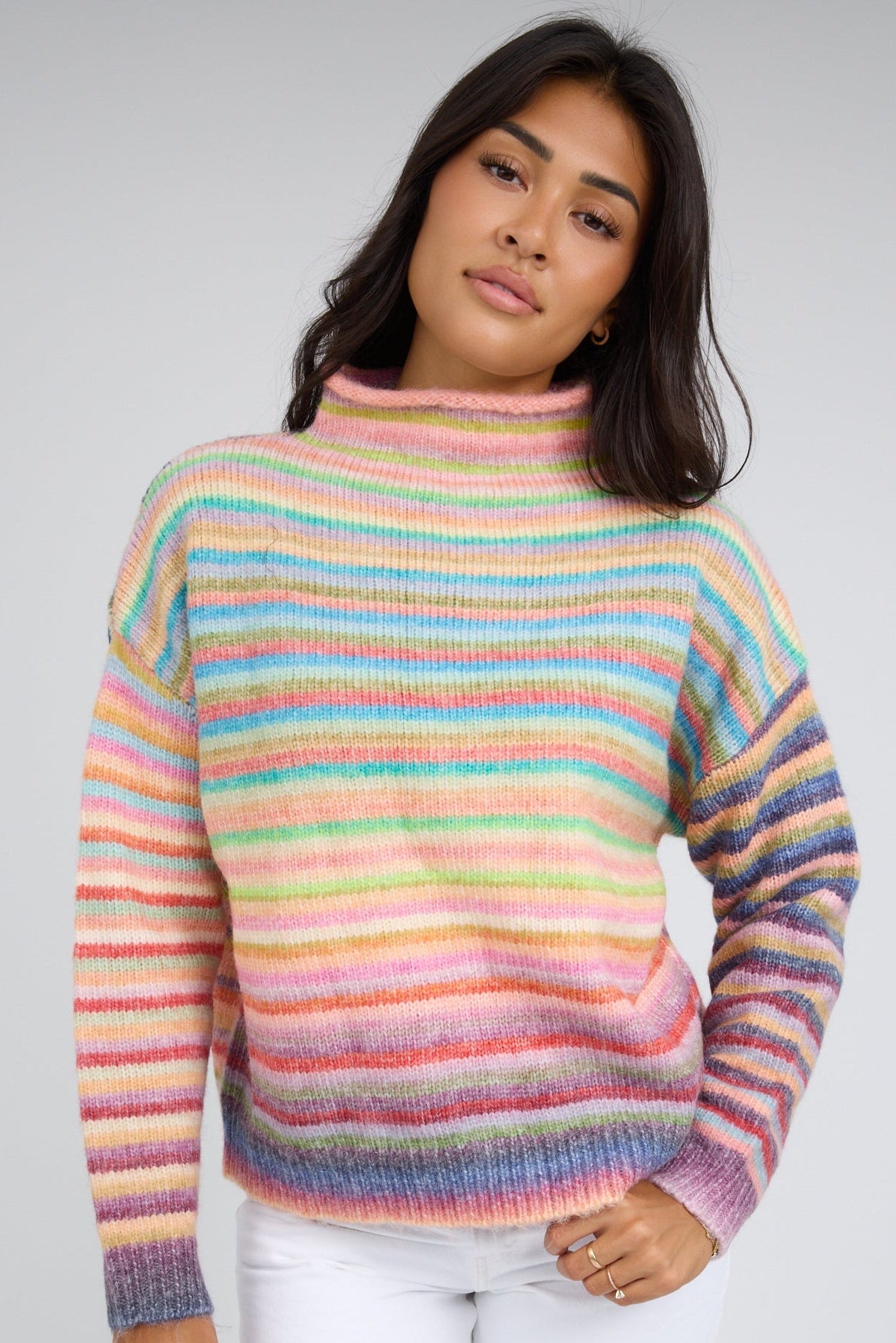 Rainbow Rollneck Sweater in rainbow stripe for women and teenage girls.