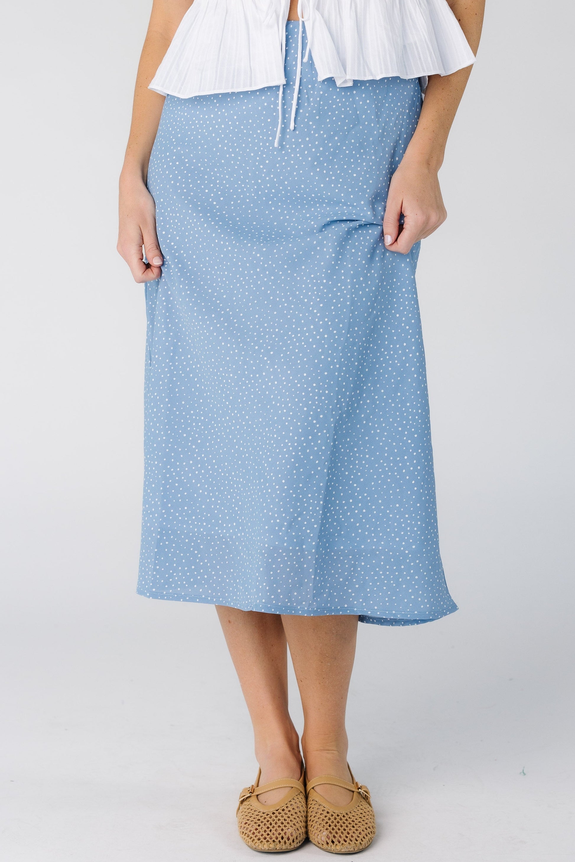 Brass & Roe The Ellie Skirt in light blue and white polka dots for women and teens.