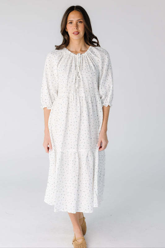 Brass & Roe Mel Gauze Midi Dress in white with blue floral for women and teens.