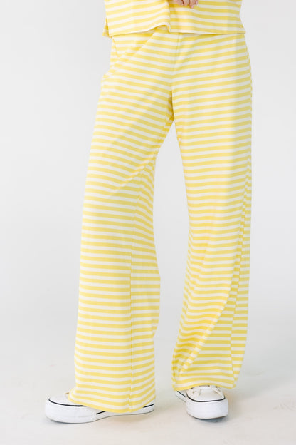 Straight Fit Stripe Pants in yellow and white for women and teens.