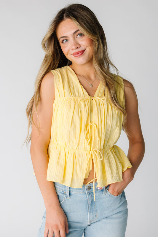 The Textured Bow Tank in yellow for women and teens.
