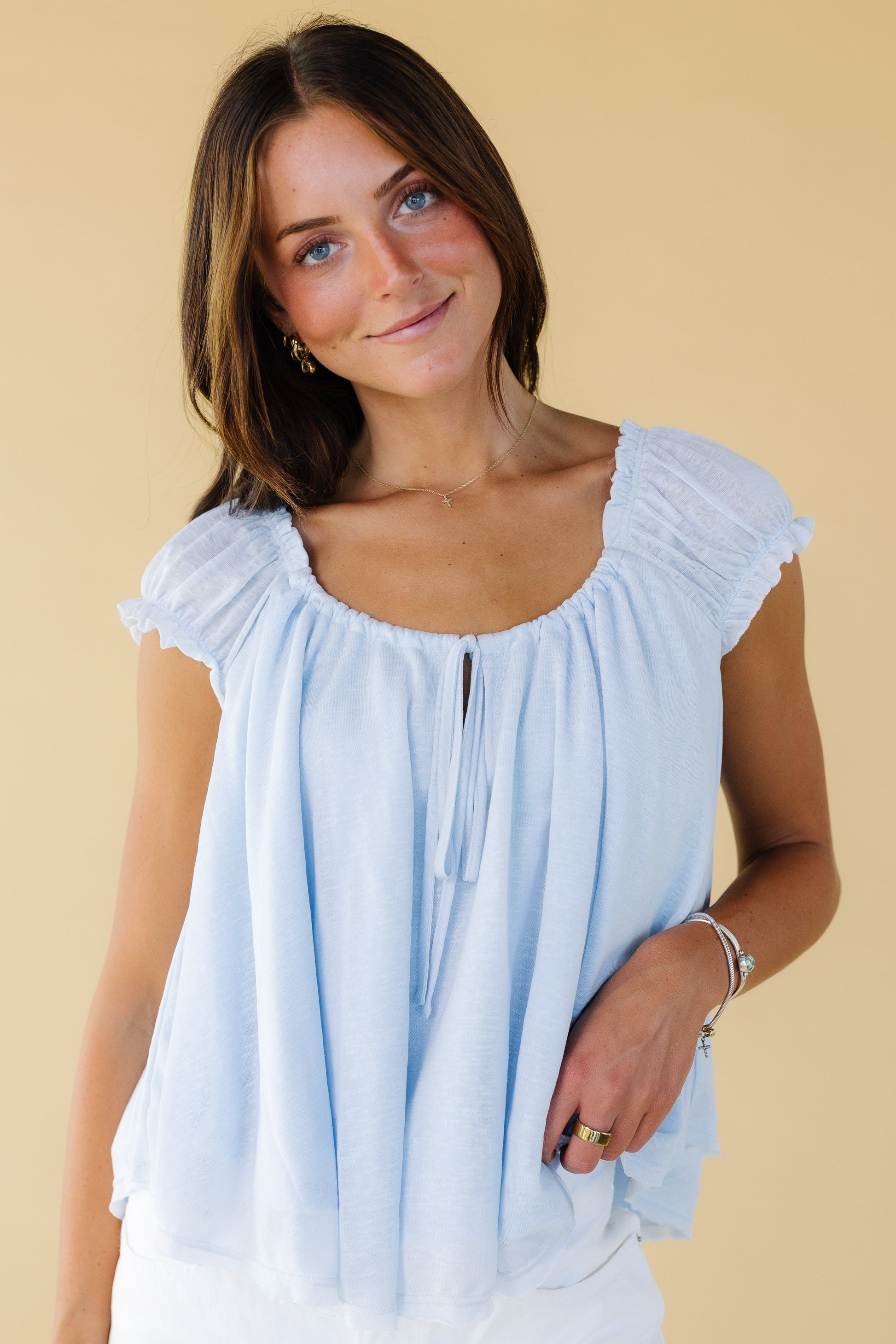 Brass & Roe Hattie Top in light blue for women and teenage girls.