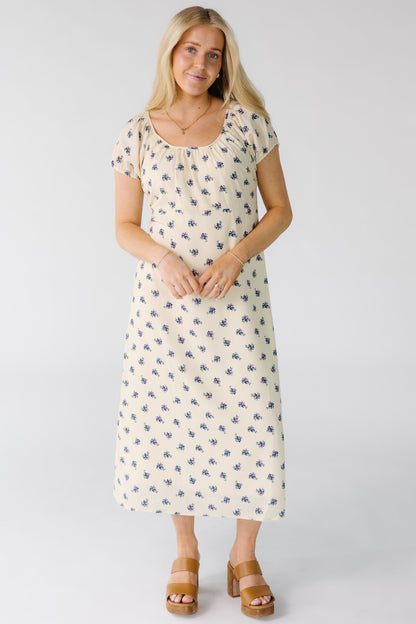Brass & Roe The Bell Dress in cream with blue floral print for women and teens.