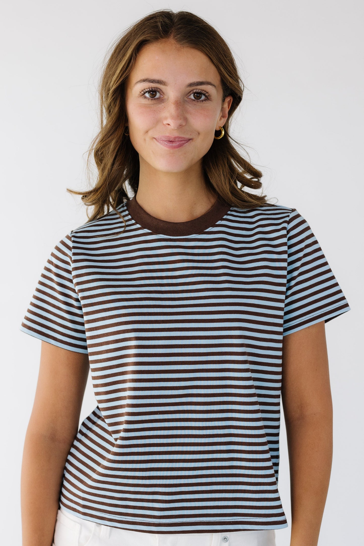 The Betsy Top in blue and brown stripe tee for women and teens.