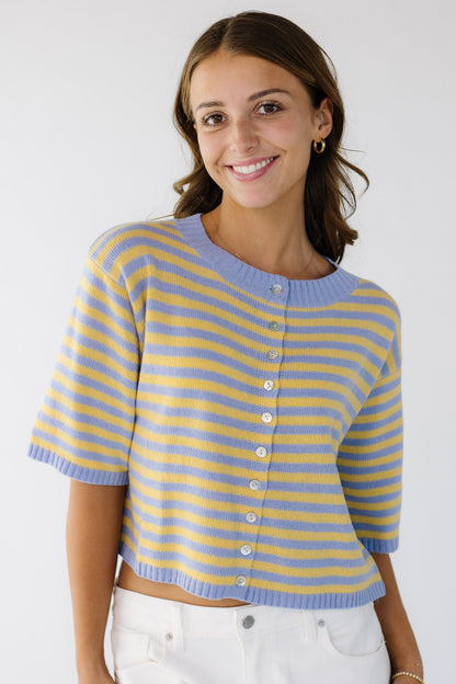 The Stripe Delta Cardigan in yellow and blue stripe cardigan that buttons down the front.