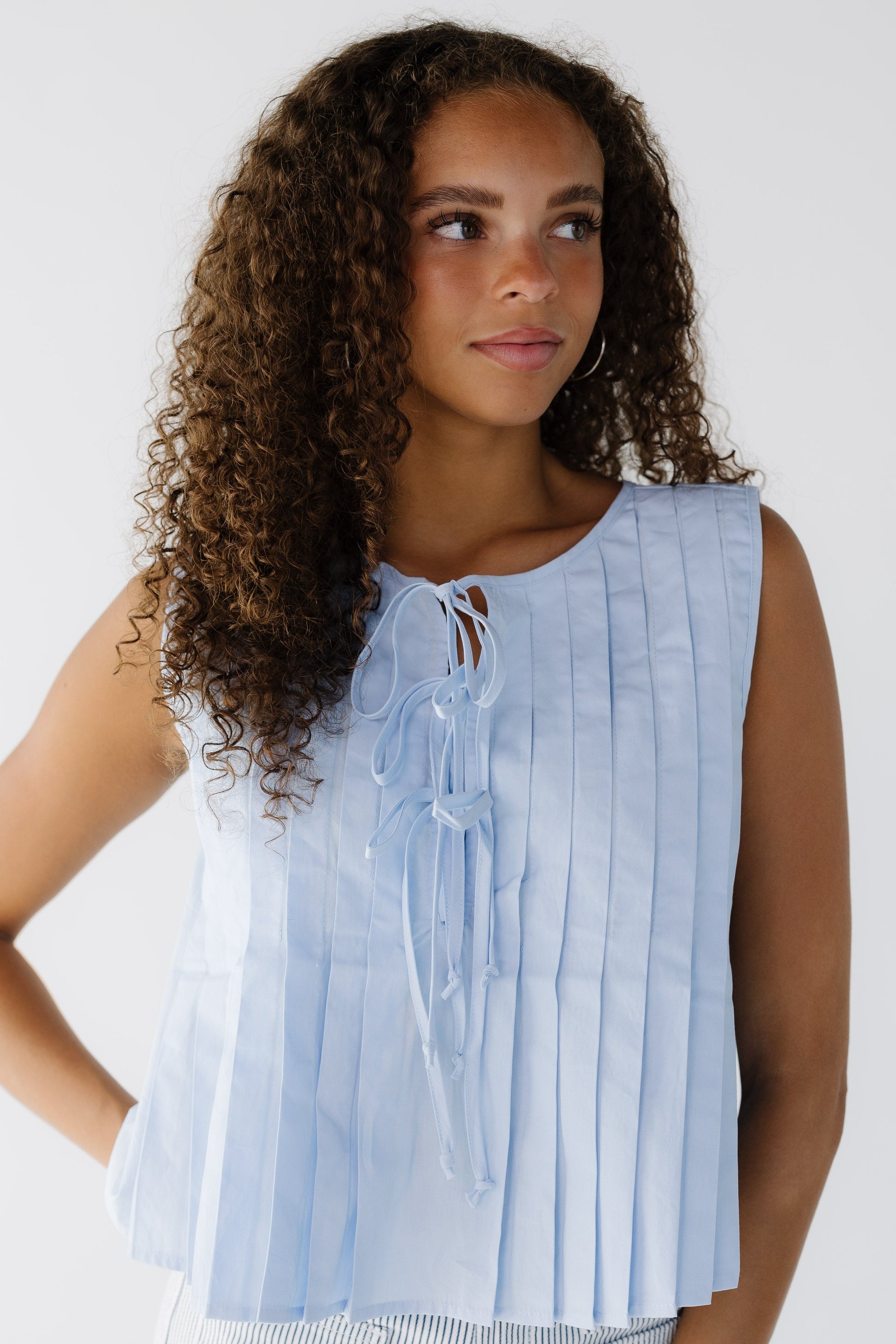 Brass & Roe Jules Flowy Top  in light blue for women and teenage girls.