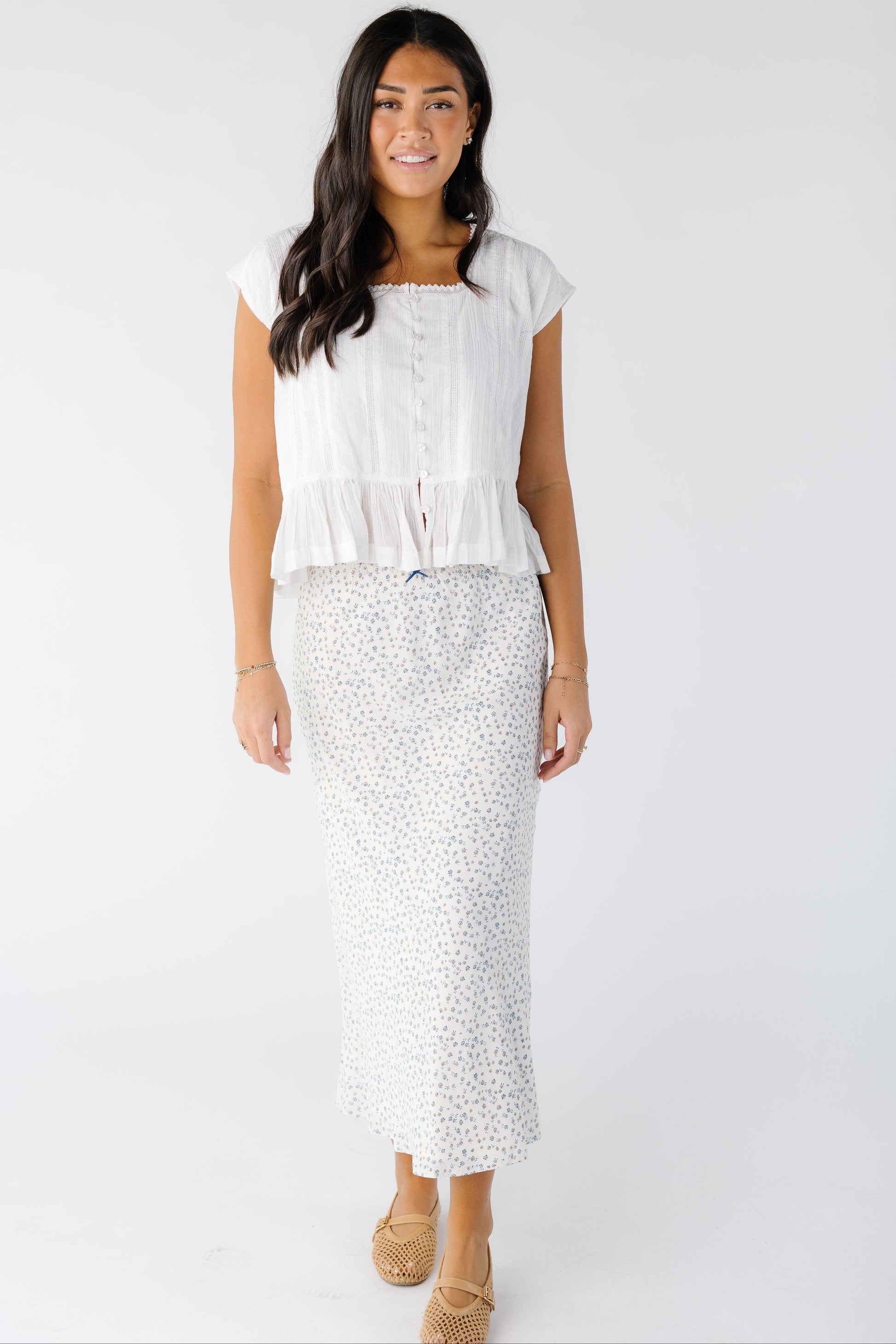 Ditsy Floral Bow Trim Skirt in white with blue floral print for women and teens.
