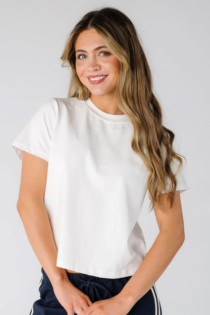 The Lanie Top in white for women and teens.