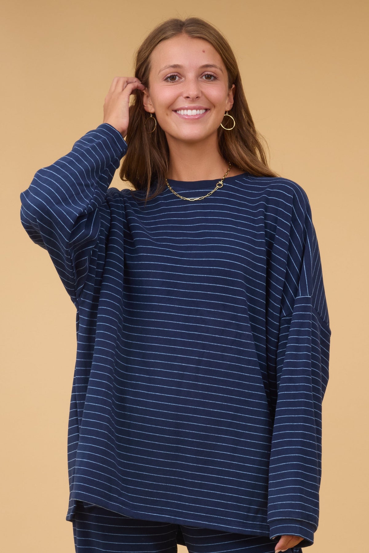 Navy Oversize Top in a navy stripe for women and teen girls.