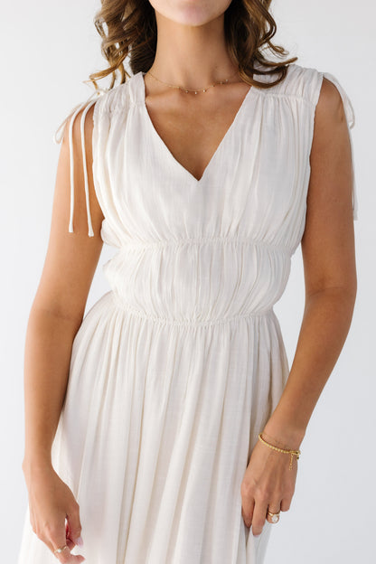 The Ava Dress in cream for women and teens.