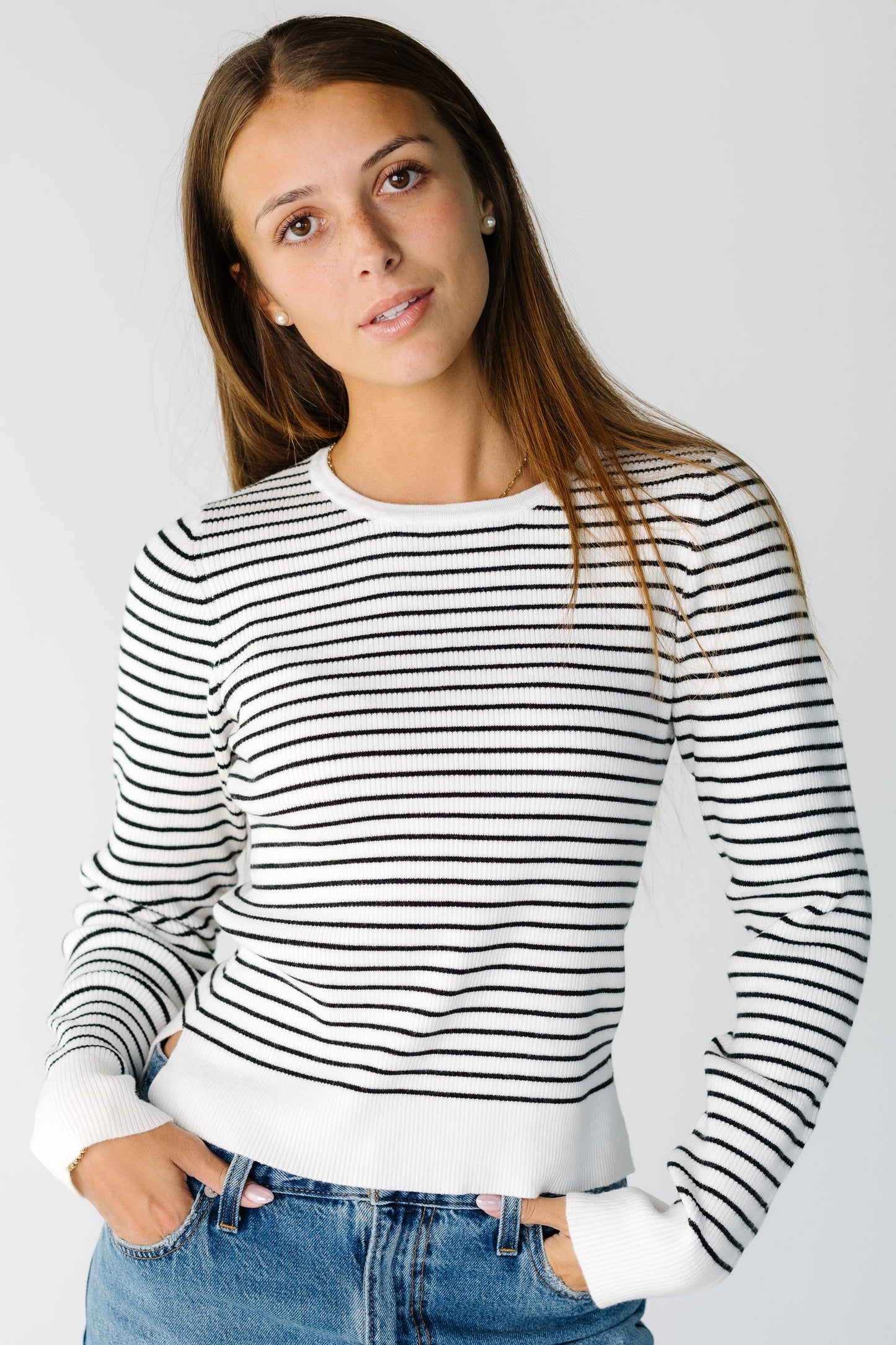 The Tara Sweater in white and black stripe for women and teens