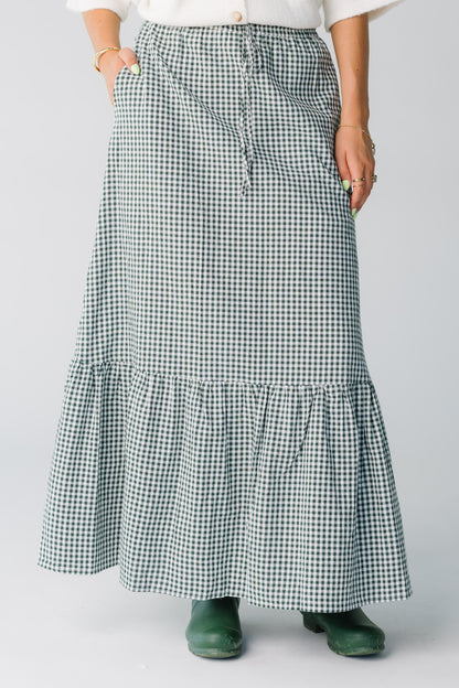 Women wearing forest green gingham maxi skirt