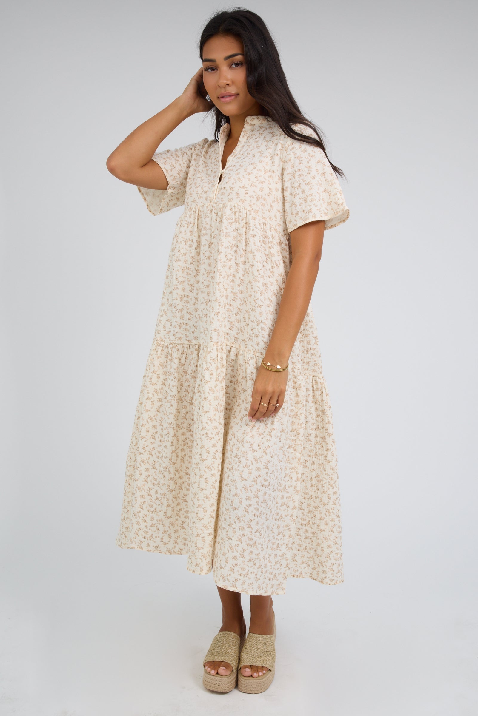 Brass & Roe Pondering Gauze Dress in ivory and tan floral print with short sleeves and a V-neckline.