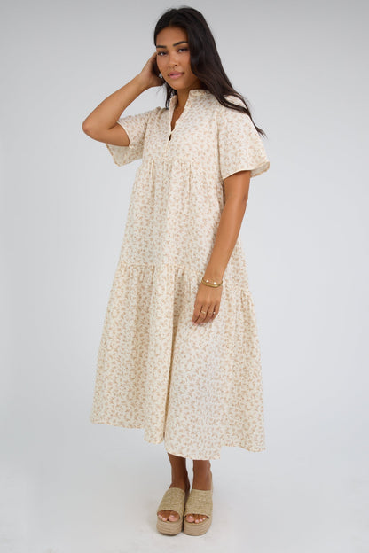 Brass & Roe Pondering Gauze Dress in ivory and tan floral print with short sleeves and a V-neckline.
