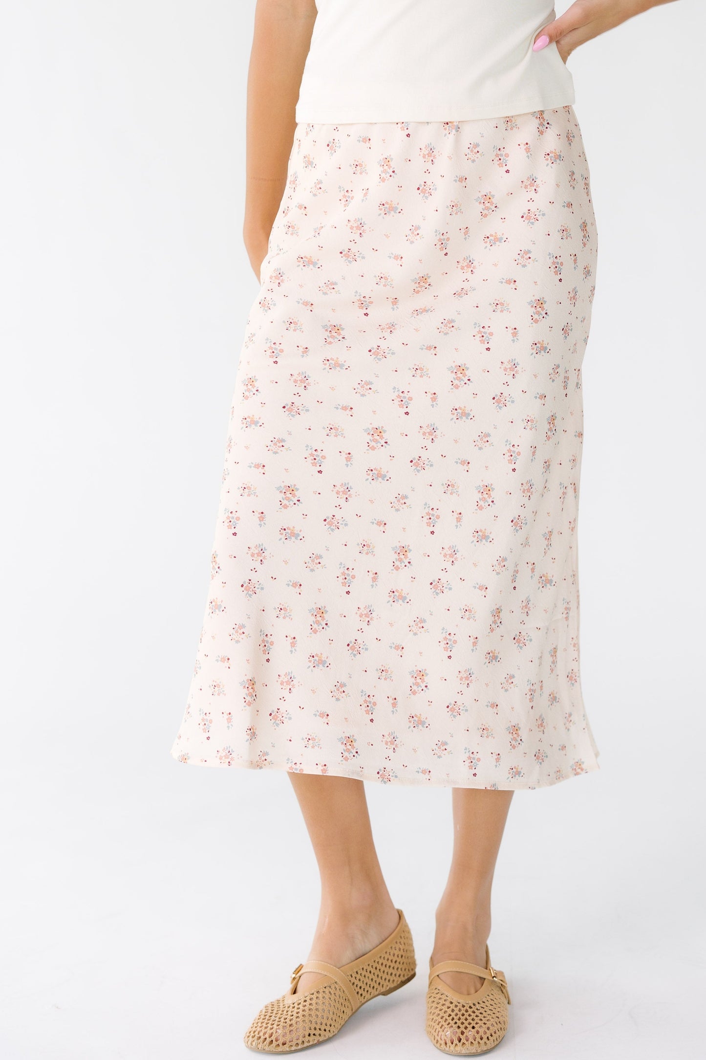 Brass & Roe Ellie Midi Skirt in pink floral print for women and teens.