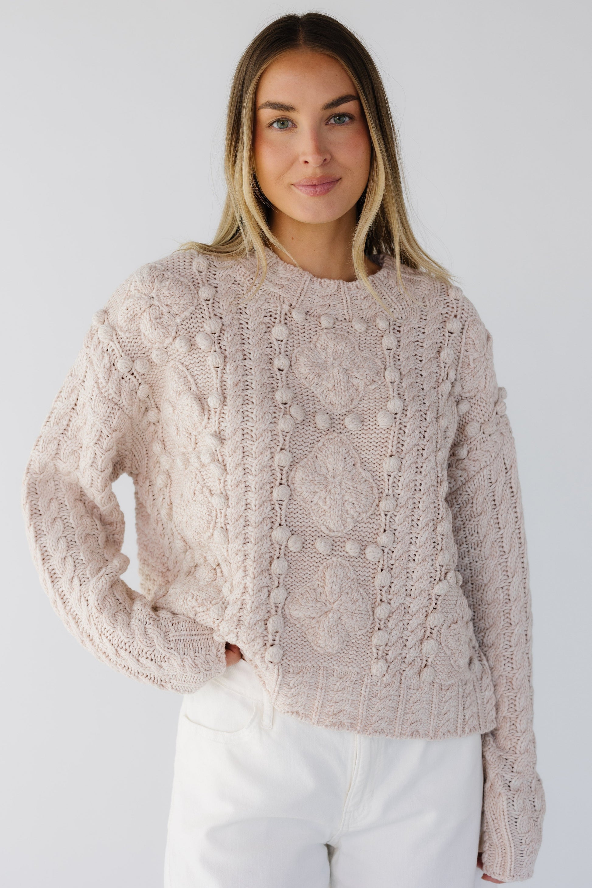 Pom Pom & cable knit sweater in cream for women and teen girls.