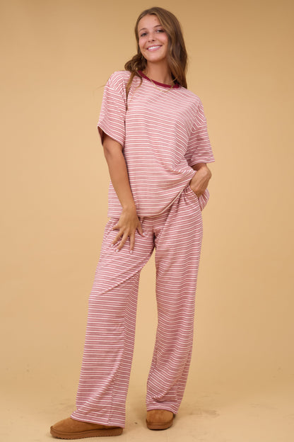 Woman wearing wide leg lounge pants with side pockets with mathing Parker Short Sleeve Top.