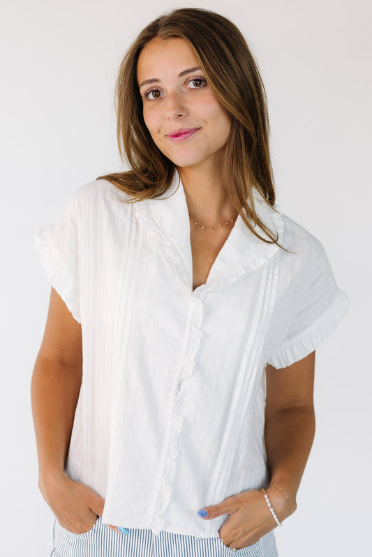 The Emmy Ruffle Blouse in white for women and teens.