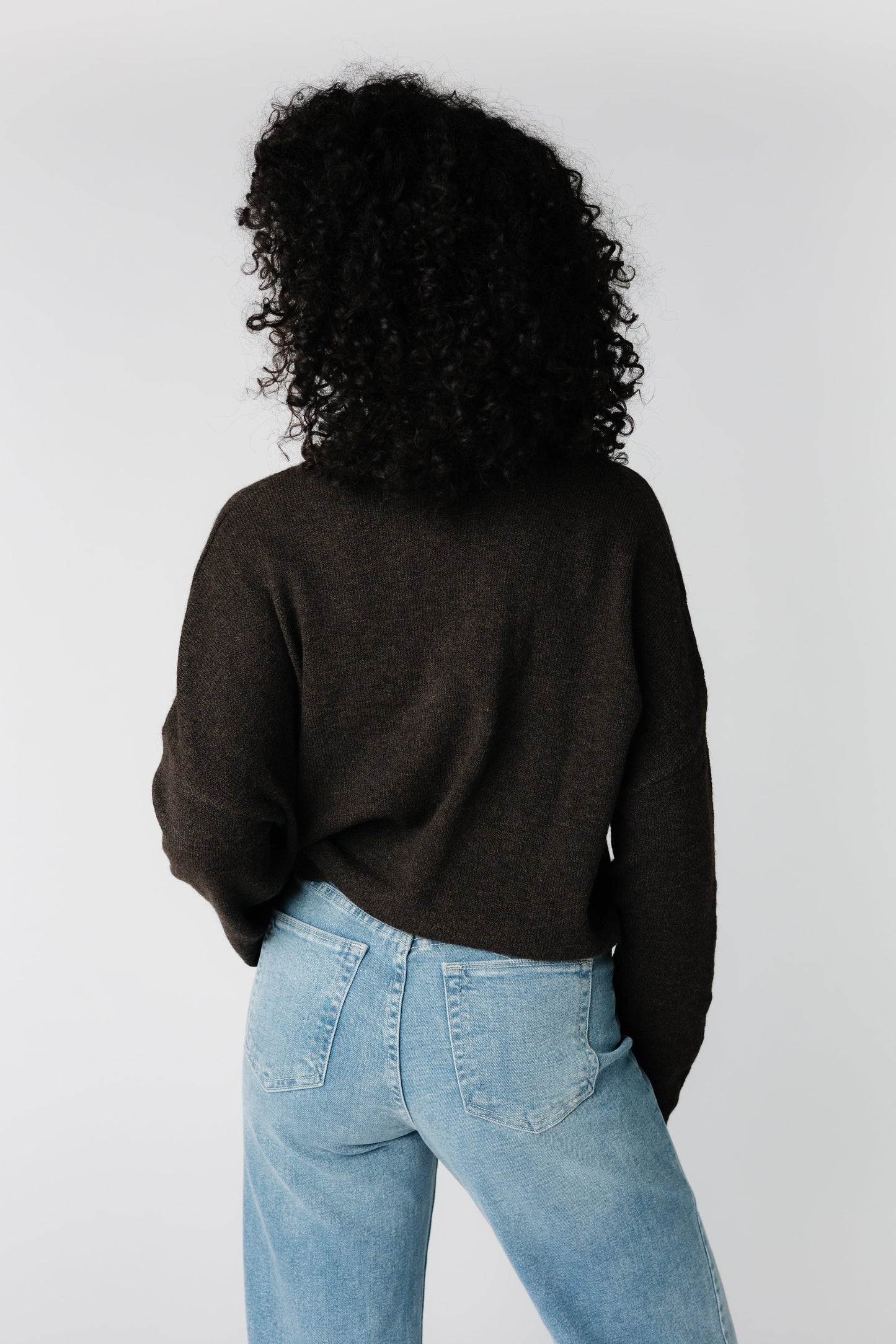 Back view of dark brown cardigan