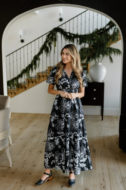 Lifestyle photo of Shae Dress in black draw print