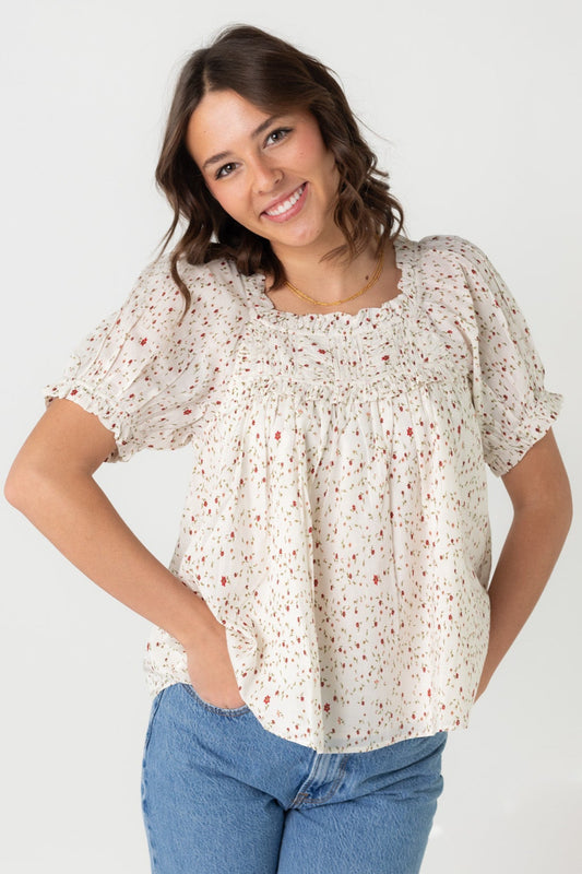 Woven floral top with scoop neck and short puff sleeves