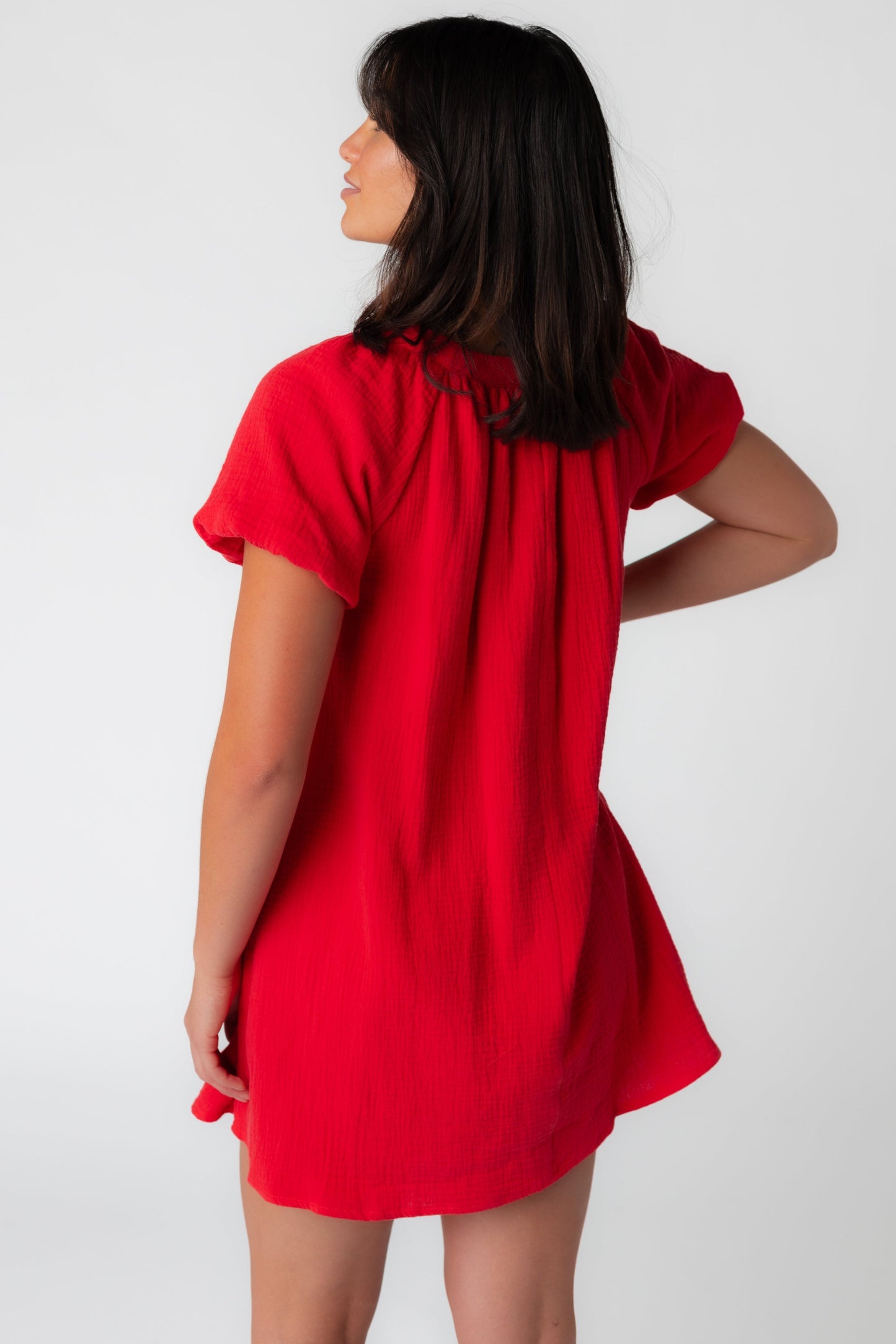 Back view of short red gauze dress