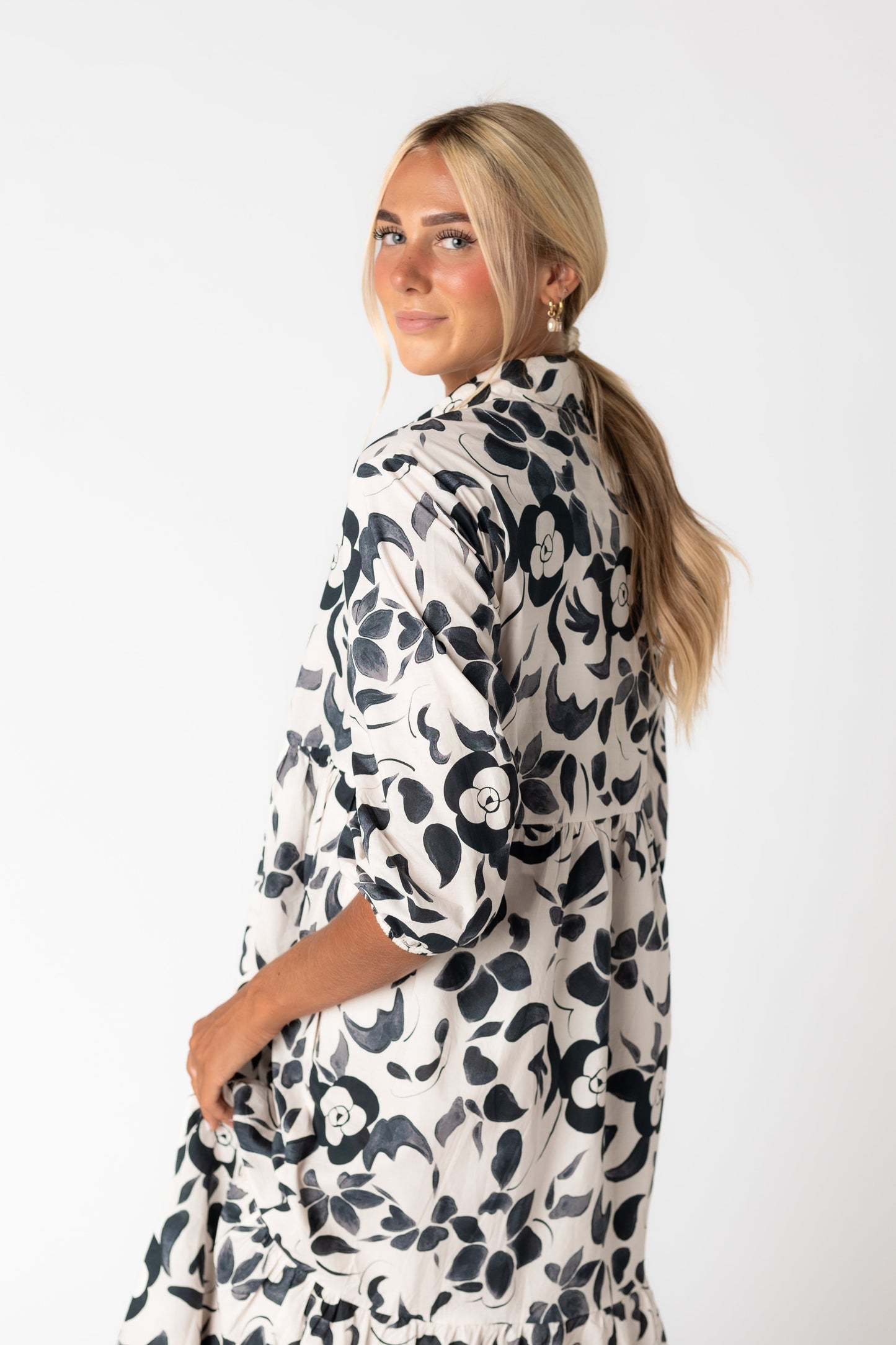 Back view of bold print midi dress