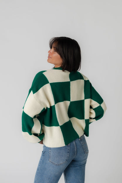 Back view of green checkered sweater