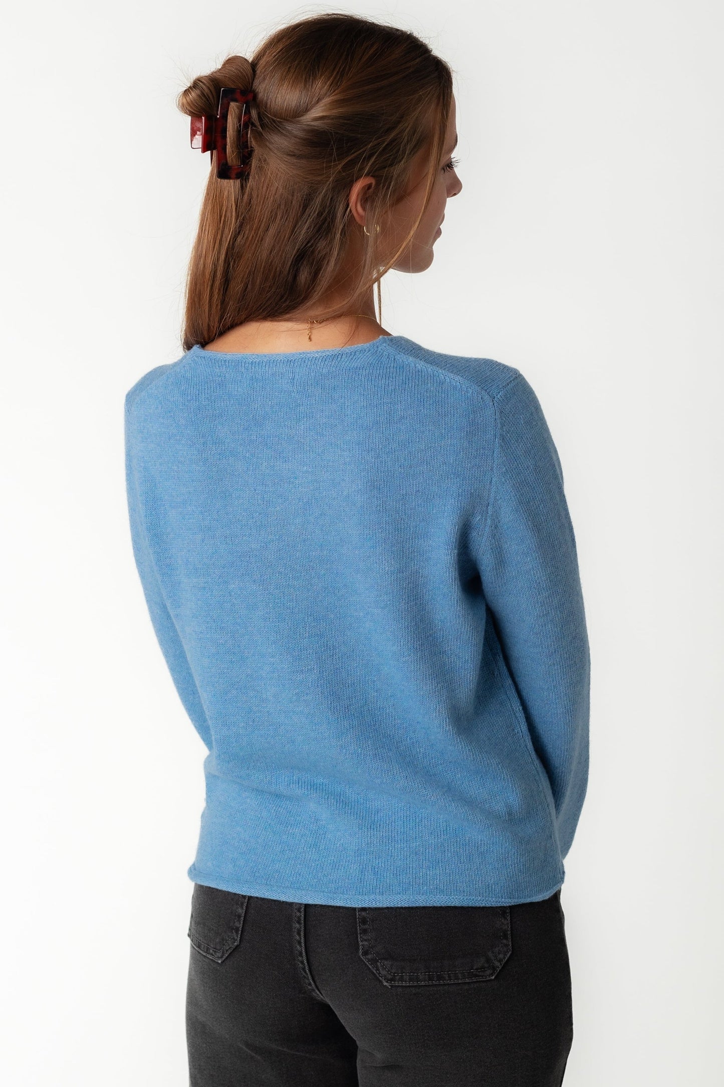 Back view of blue cardigan