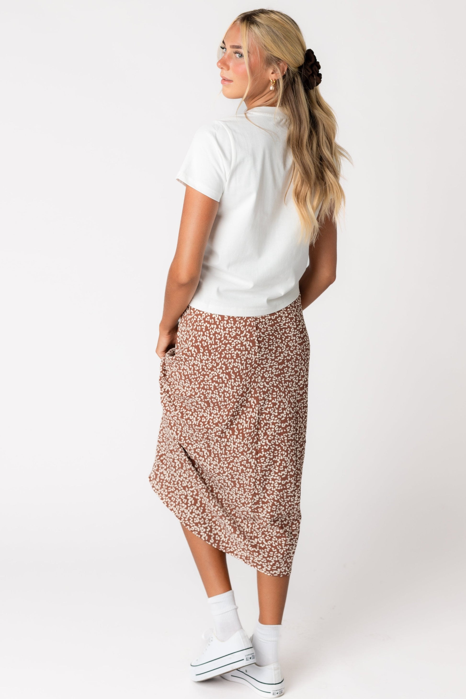 Back view of mocha leopard print midi skirt