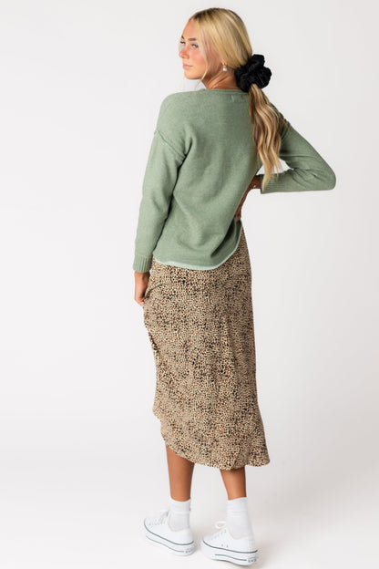 Back view of light green pullover sweater