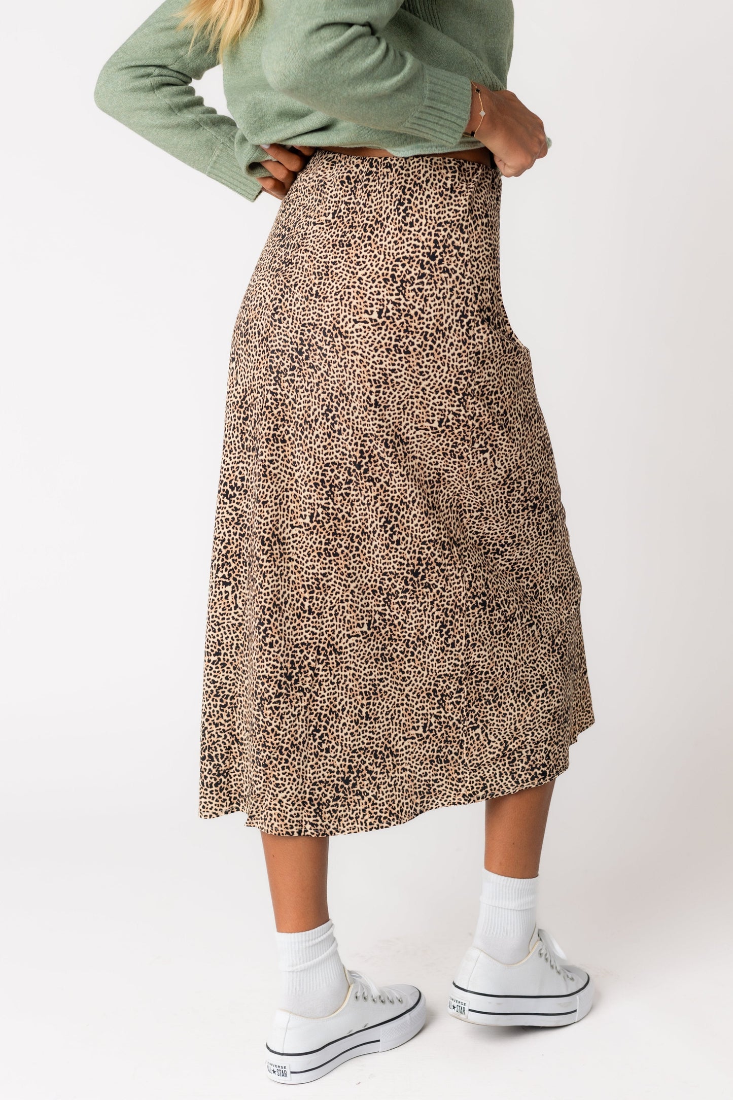 Back view of brown leopard print A-line midi skirt