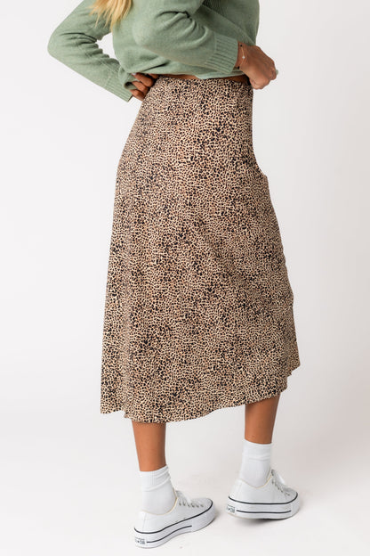 Back view of brown leopard print A-line midi skirt