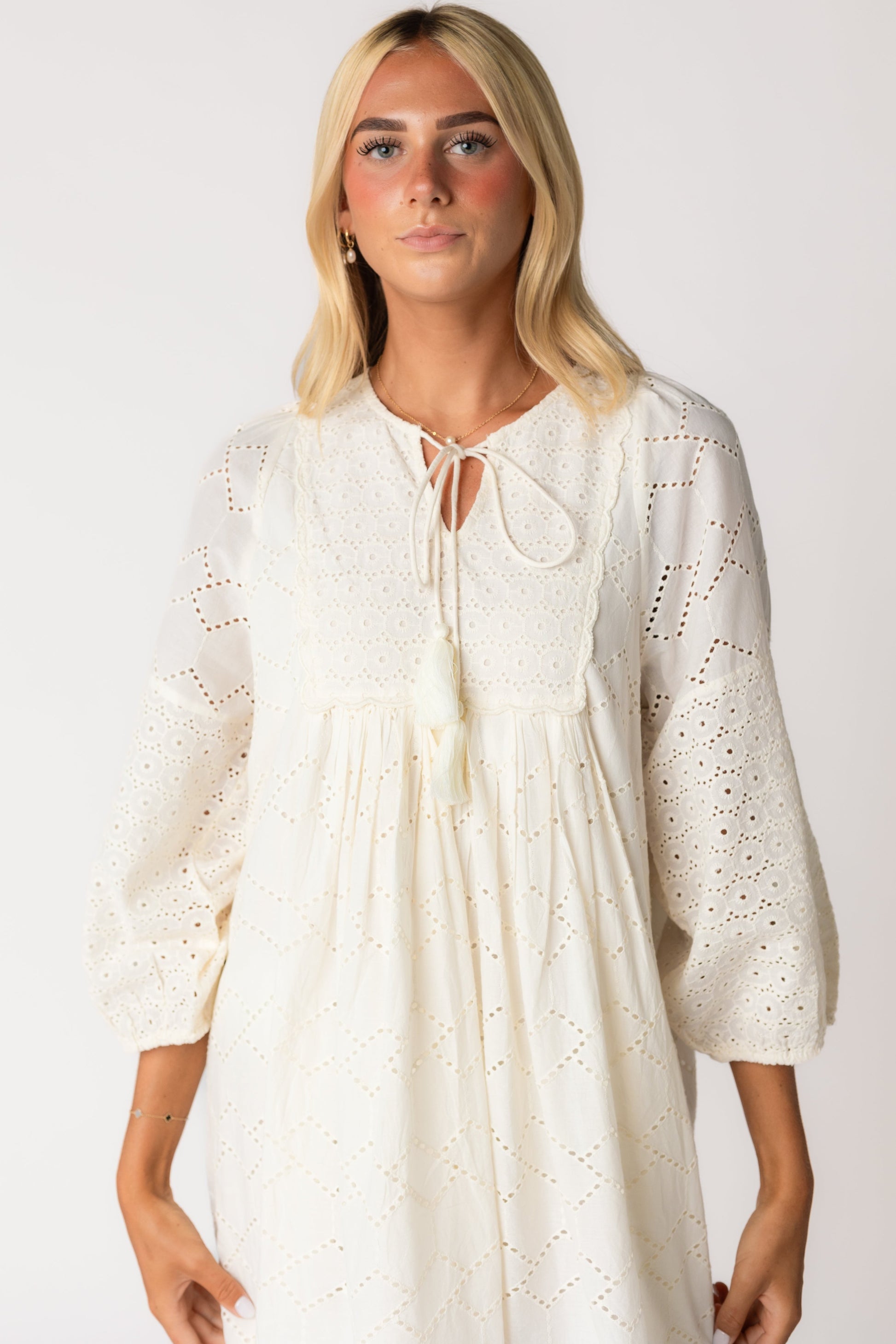 Close view of Citrus Cherish 2 Eyelet Tunic knee length dress