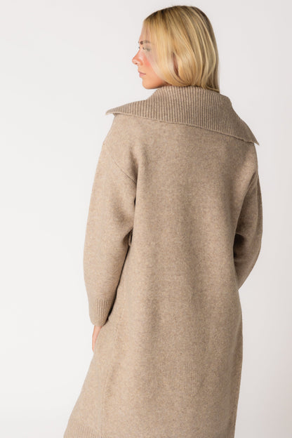 Back view of mushroom color sweater jacket with wide  ribbed collar