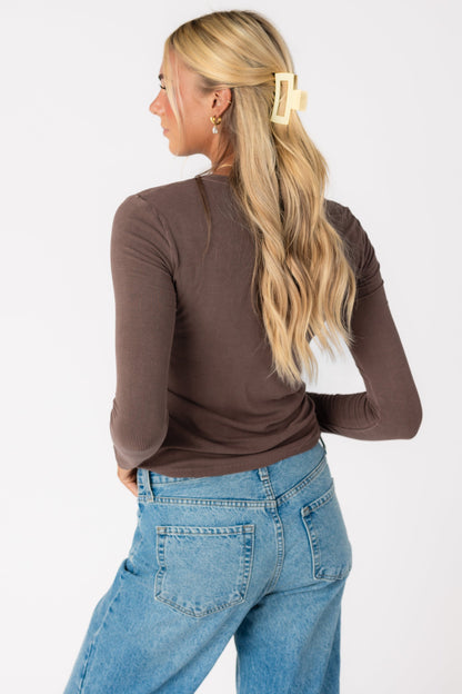 Back view of long sleeve brown top