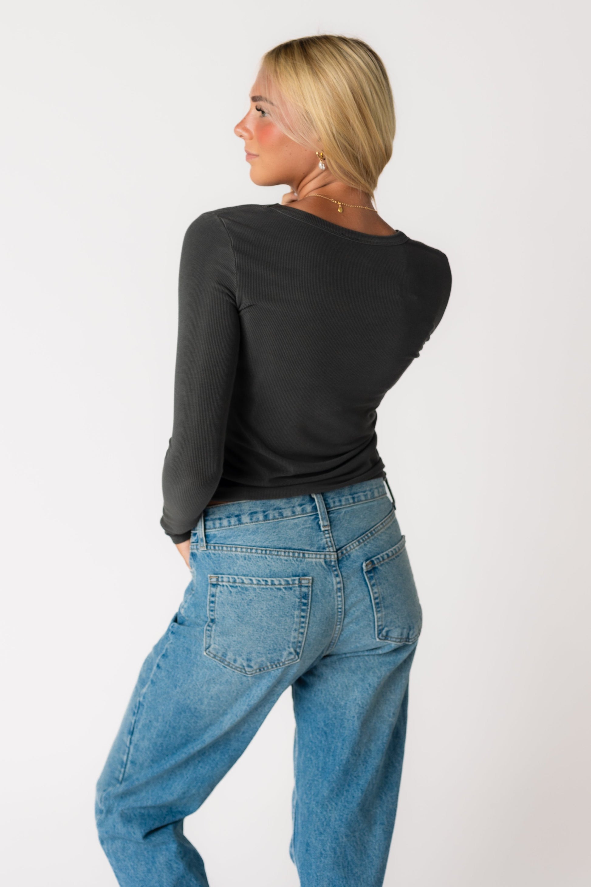 Back view of long sleeve top in charcoal