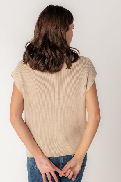 Back view of champagne short sleeve sweater with mock turtleneck