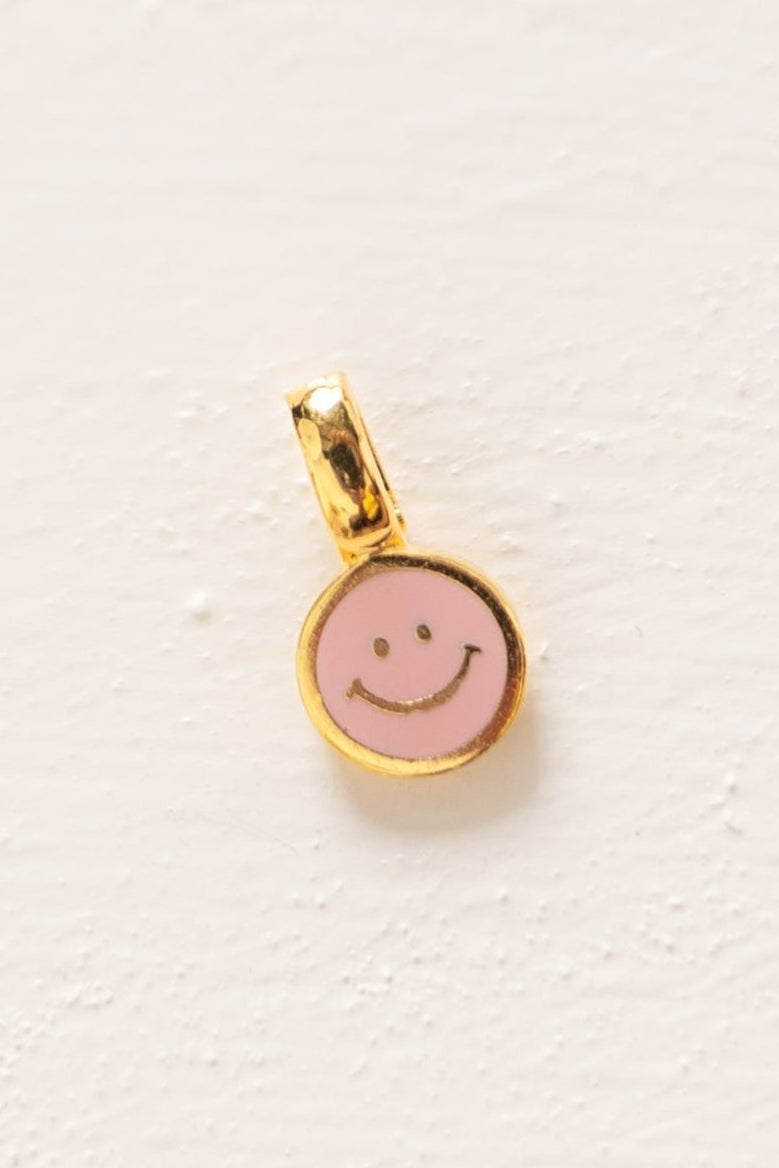 Cove Smiley Clip On Charm to clip on a necklace or bracelet in pink
